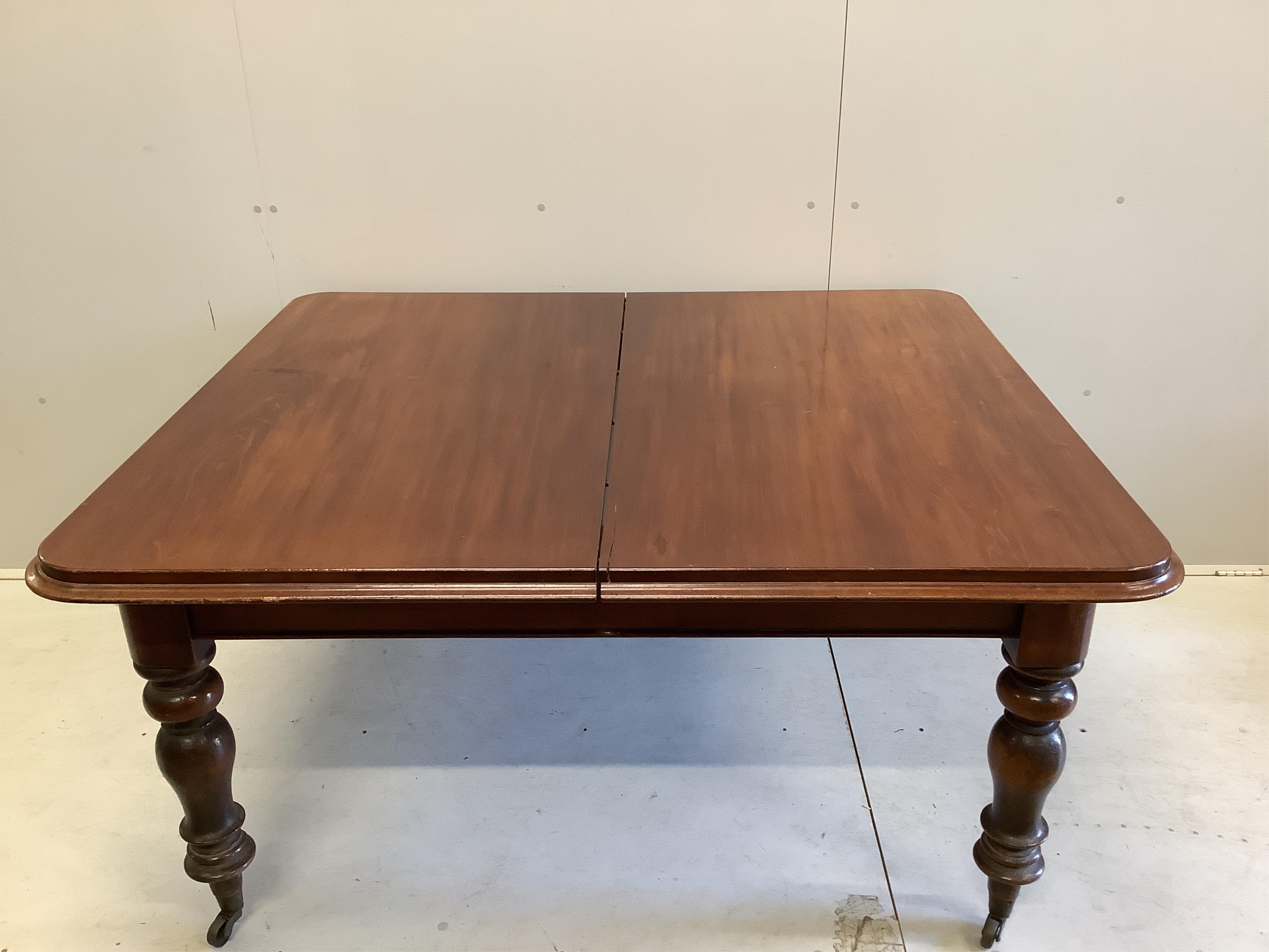 A Victorian mahogany rectangular extending dining table, width 209cm fully extended, depth 129cm, height 73cm
